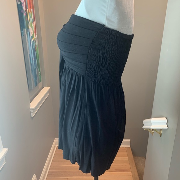 Black strapless smocked flowy top. Size medium. - Picture 5 of 13